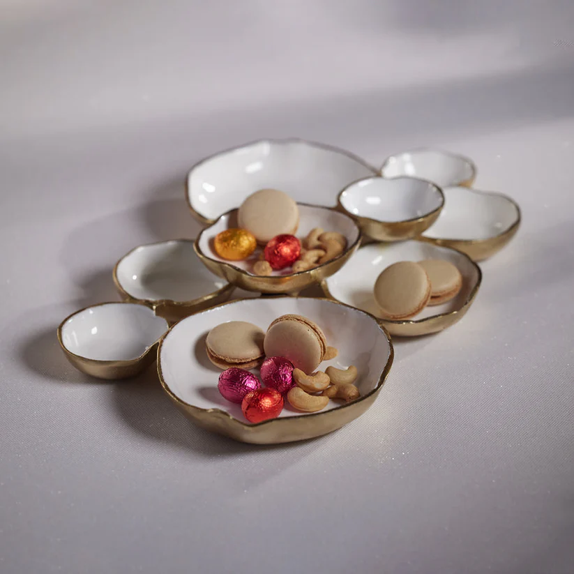 CLUSTER OF NINE ROUND SERVING BOWLS