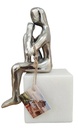 SILVER FIGURINE ON MARBLE BASE   