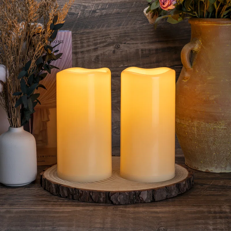  8" WATERPROOF OUTDOOR FLAMELESS PILLAR CANDLE WITH REMOTE AND TIMERS (WARM YELLOW LIGHT) 